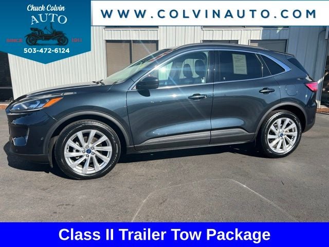 2022 Ford Escape Hybrid Titanium in Blue Metallic — front three-quarter view