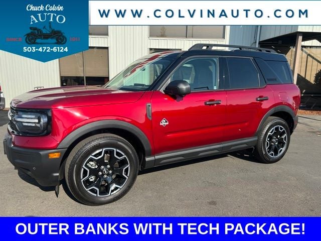 2026 Ford Bronco Sport Outer Banks in Ruby Red Metallic Tinted Clearcoat — front three-quarter view
