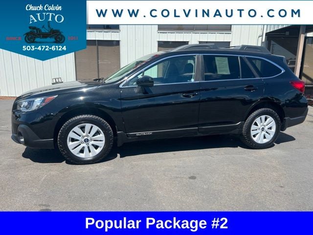 2019 Subaru Outback 2.5i Premium in Crystal Black Silica — front three-quarter view