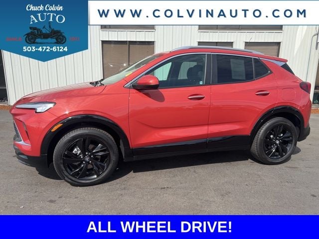 2024 Buick Encore GX Sport Touring in Red Metallic — front three-quarter view