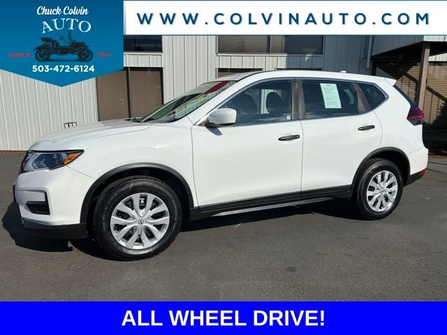 2018 Nissan Rogue S in Glacier White — front three-quarter view